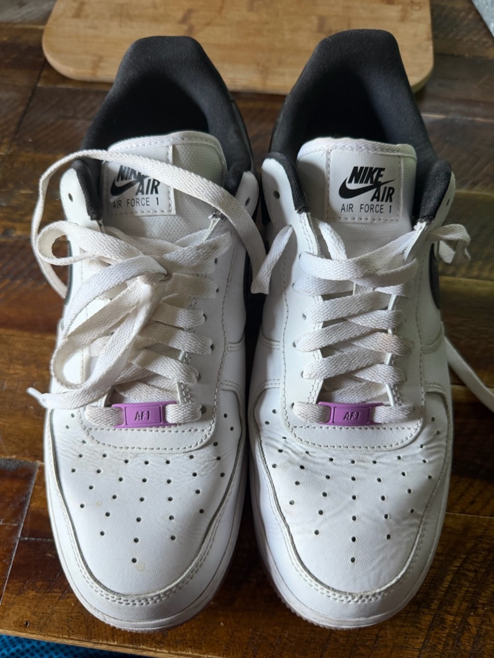 Nike White Sneakers with Black Collar and Purple Lace Tag